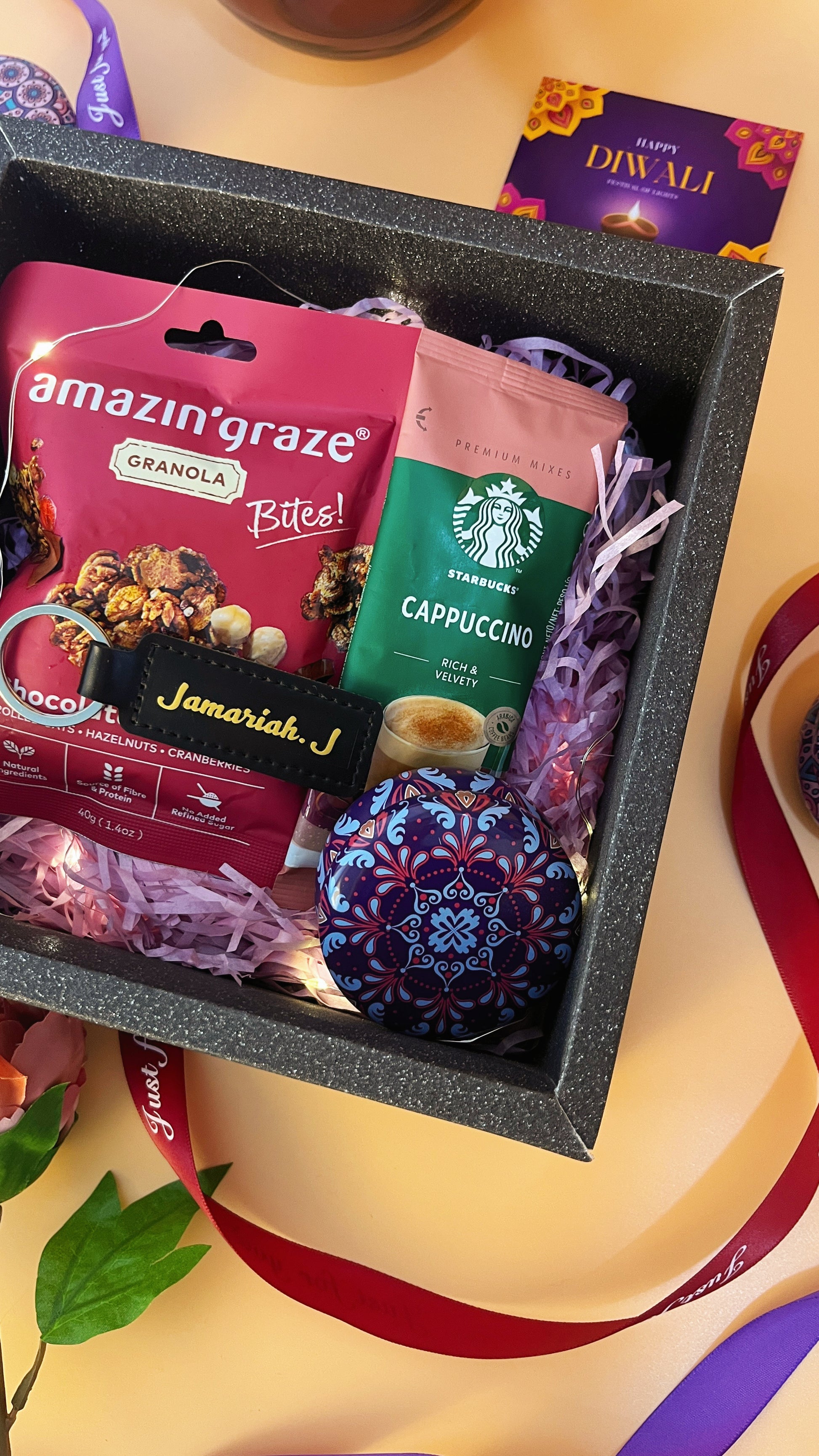 another top down close up shot of the Diwali snacks in the gift box