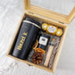 black flasks and black mini scented candle in wooden gift box