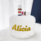 closeup shot of the diffuser with essential oils laid on it with name engraving 'Alicia'